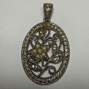 HAN Sterling Silver Oval Flower Pendant. 1.5 inches long